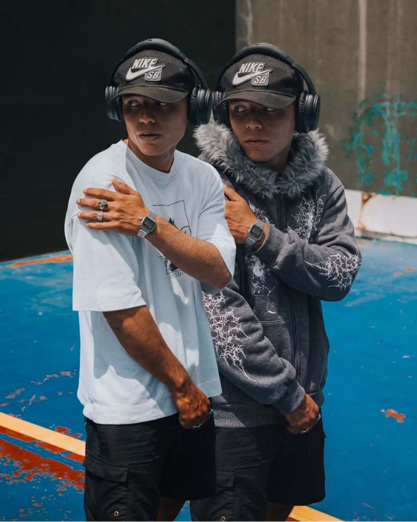 Man comparing two different outfit styles with casual and streetwear looks, showing how virtual try-on clothes helps match clothing to your personal style before choosing what to wear or buy