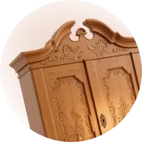 Ask My Wardrobe logo featuring a carved wooden wardrobe, representing an app for generating and planning outfits.